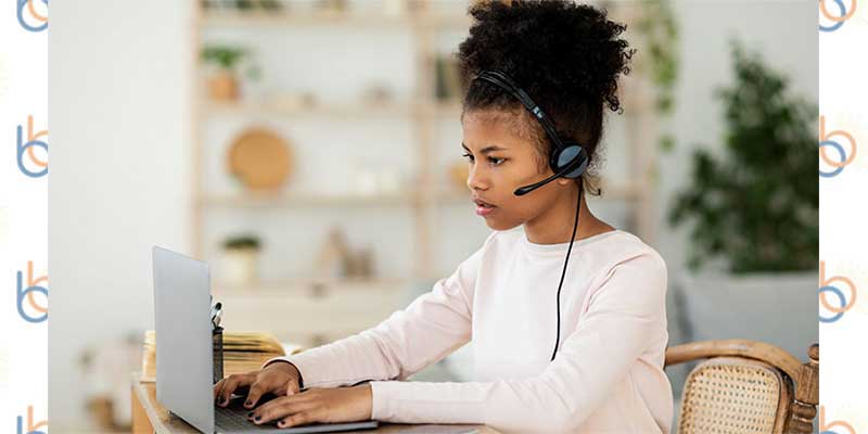 child on laptop, distance learning, online instruction, african-american girl wearing headset