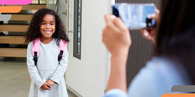 back to school, smiling girl, proud parent, pictures, smartphone